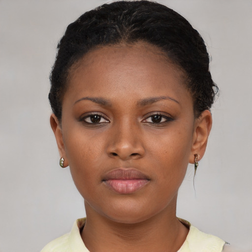 Neutral black young-adult female with short  brown hair and brown eyes
