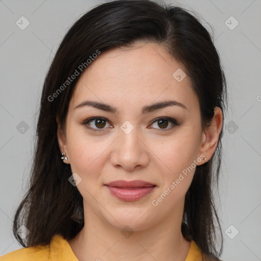 Joyful latino young-adult female with medium  brown hair and brown eyes