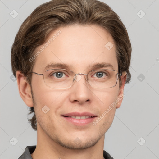 Joyful white adult male with short  brown hair and grey eyes