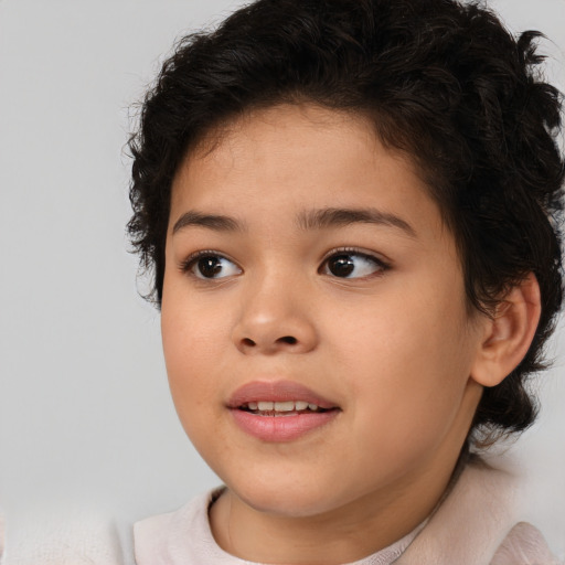 Joyful asian child female with medium  brown hair and brown eyes