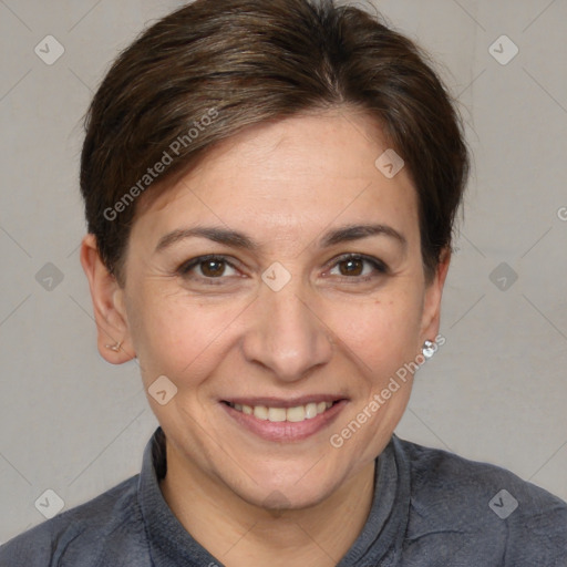 Joyful white adult female with short  brown hair and brown eyes