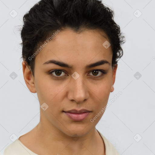 Joyful latino young-adult female with short  brown hair and brown eyes