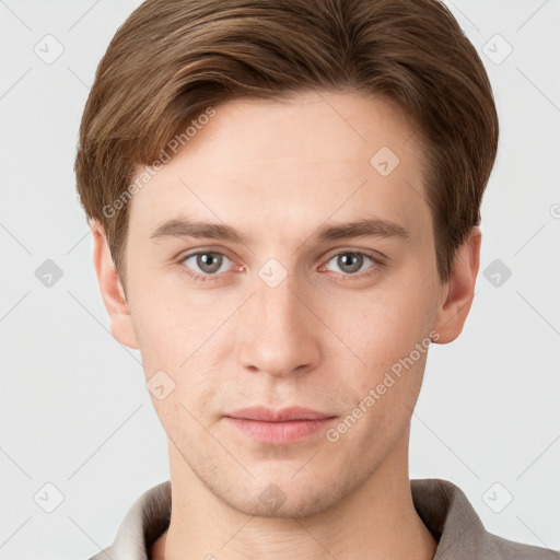 Neutral white young-adult male with short  brown hair and grey eyes