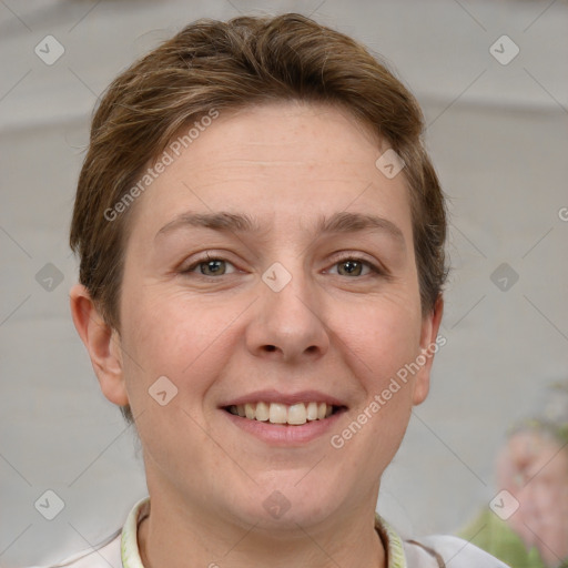 Joyful white young-adult female with short  brown hair and grey eyes