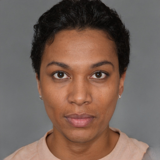 Neutral black young-adult female with short  black hair and brown eyes