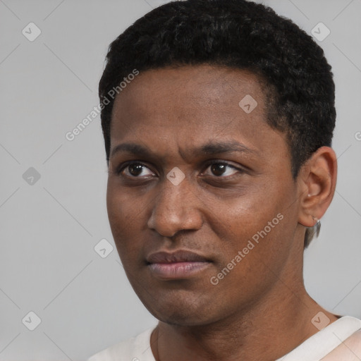 Neutral black young-adult male with short  black hair and brown eyes