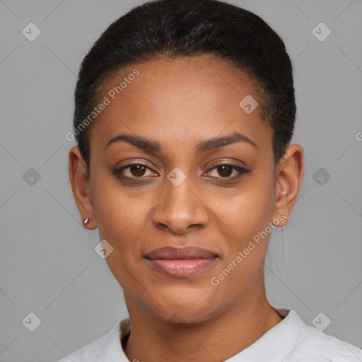 Joyful black young-adult female with short  black hair and brown eyes