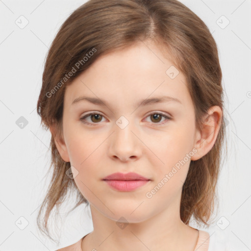 Joyful white child female with medium  brown hair and brown eyes