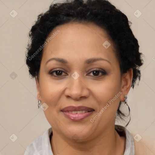 Joyful latino adult female with short  brown hair and brown eyes