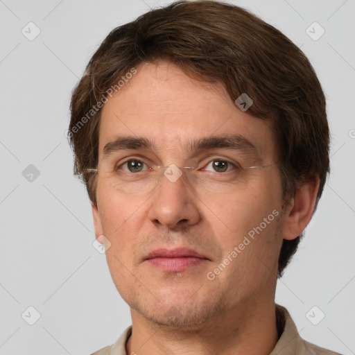 Joyful white adult male with short  brown hair and grey eyes