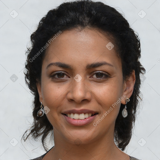 Joyful latino young-adult female with long  brown hair and brown eyes