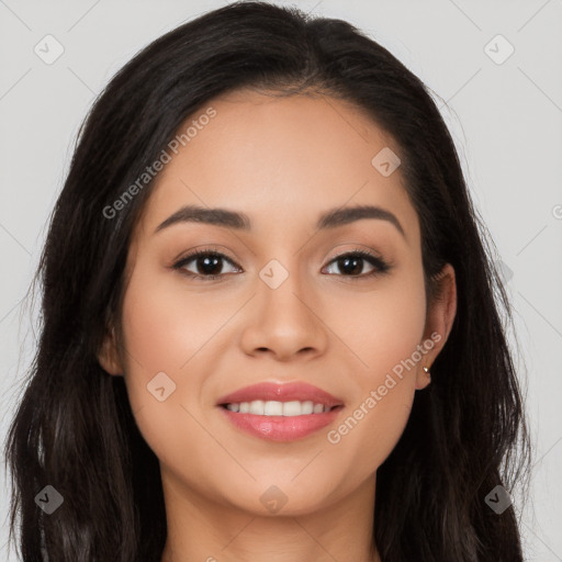 Joyful latino young-adult female with long  brown hair and brown eyes