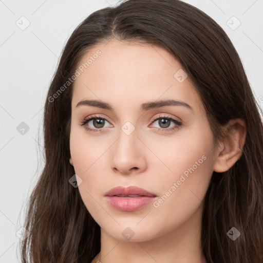 Neutral white young-adult female with long  brown hair and brown eyes