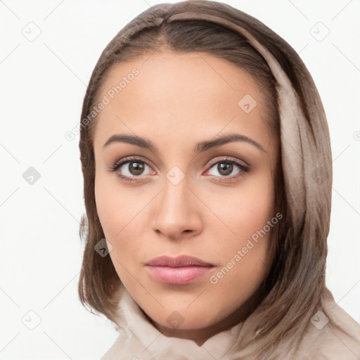 Neutral white young-adult female with long  brown hair and brown eyes