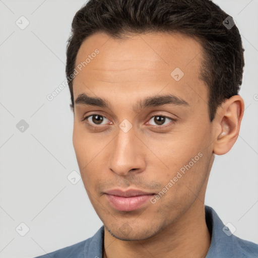 Neutral white young-adult male with short  brown hair and brown eyes