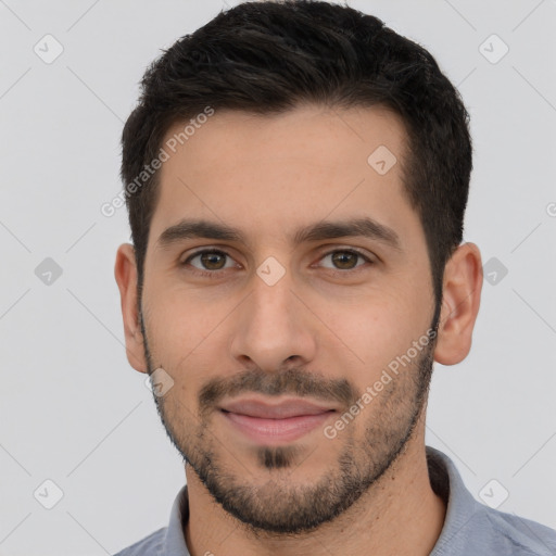 Joyful white young-adult male with short  brown hair and brown eyes