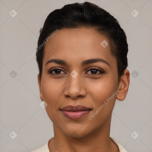 Joyful latino young-adult female with short  black hair and brown eyes