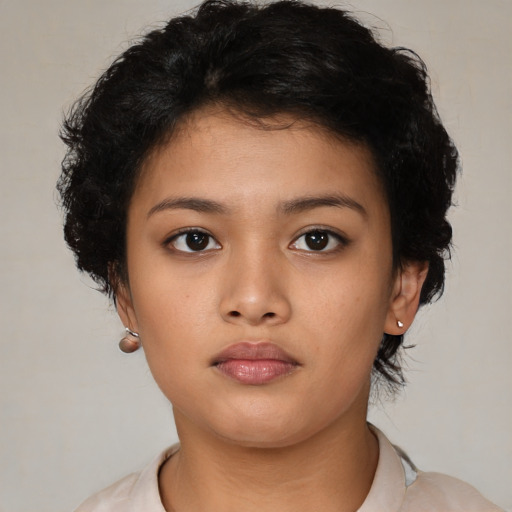 Neutral latino young-adult female with short  brown hair and brown eyes