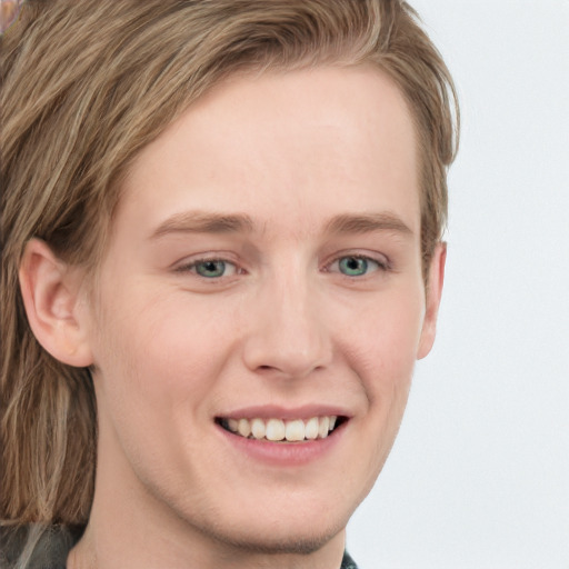 Joyful white young-adult female with long  brown hair and blue eyes