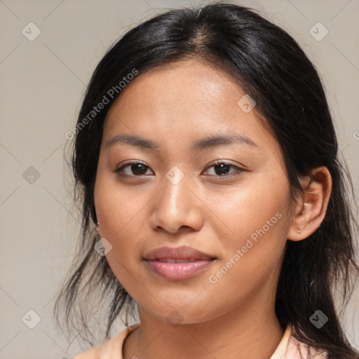 Joyful asian young-adult female with medium  brown hair and brown eyes