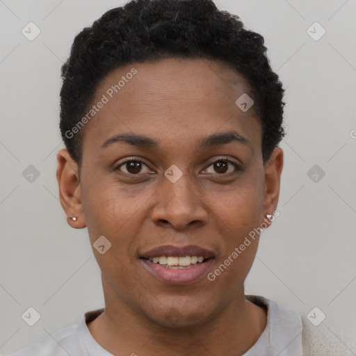 Joyful black young-adult female with short  black hair and brown eyes