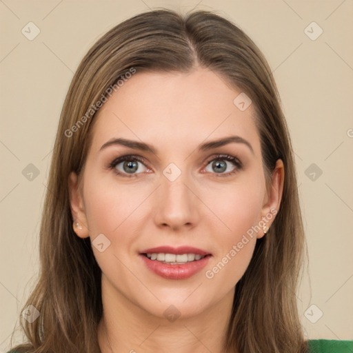 Joyful white young-adult female with long  brown hair and green eyes