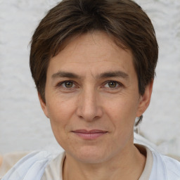 Joyful white adult female with short  brown hair and brown eyes