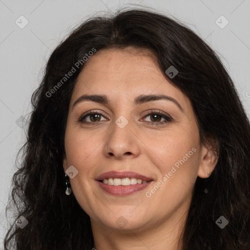 Joyful white adult female with long  brown hair and brown eyes