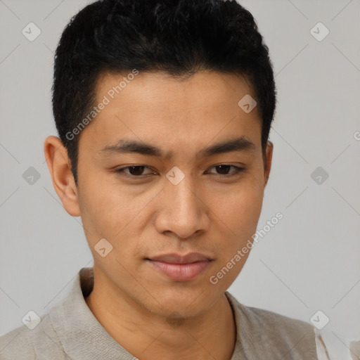 Joyful asian young-adult male with short  brown hair and brown eyes