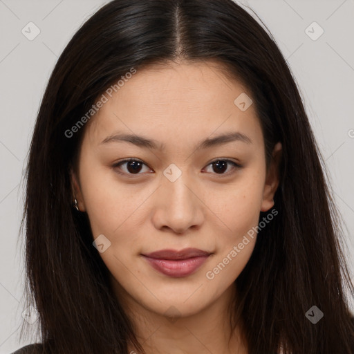 Joyful asian young-adult female with long  brown hair and brown eyes