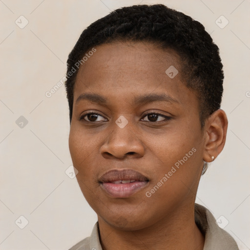 Joyful black young-adult female with short  black hair and brown eyes