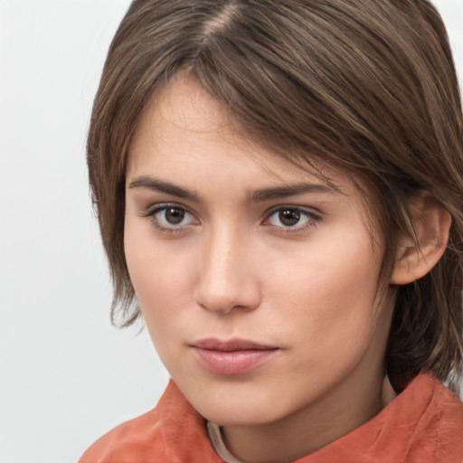 Neutral white young-adult female with medium  brown hair and brown eyes