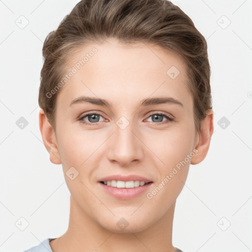 Joyful white young-adult female with short  brown hair and grey eyes