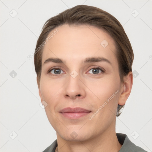 Joyful white young-adult female with short  brown hair and brown eyes