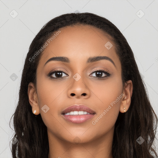 Joyful latino young-adult female with long  black hair and brown eyes