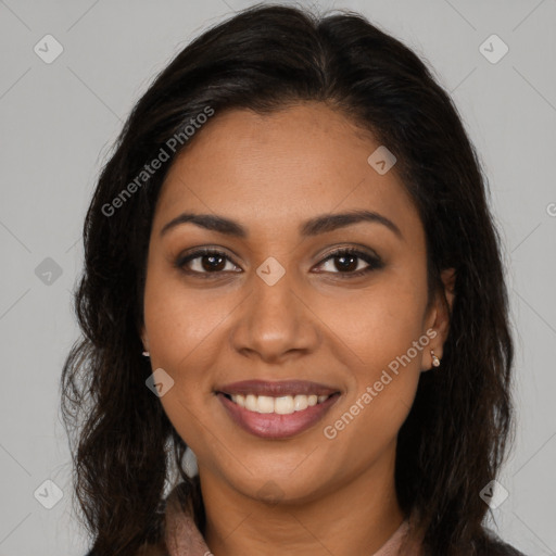 Joyful latino young-adult female with long  brown hair and brown eyes