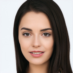 Joyful white young-adult female with long  black hair and brown eyes