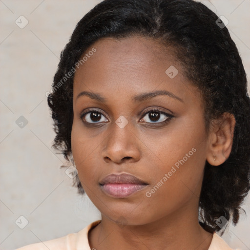 Neutral black young-adult female with medium  brown hair and brown eyes