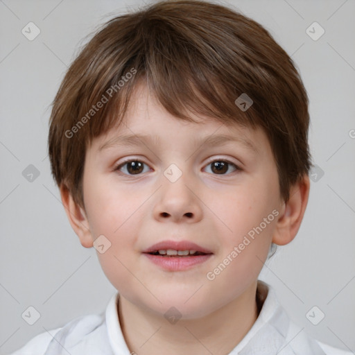 Joyful white child male with short  brown hair and brown eyes