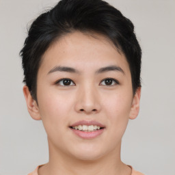 Joyful asian young-adult female with short  black hair and brown eyes