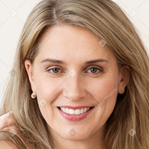 Joyful white young-adult female with long  brown hair and grey eyes