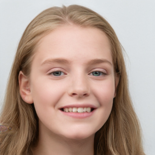 Joyful white child female with long  brown hair and blue eyes