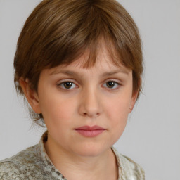 Neutral white child female with medium  brown hair and brown eyes