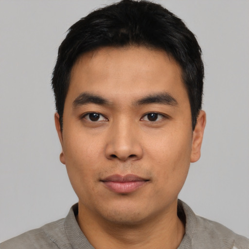 Neutral asian young-adult male with short  black hair and brown eyes
