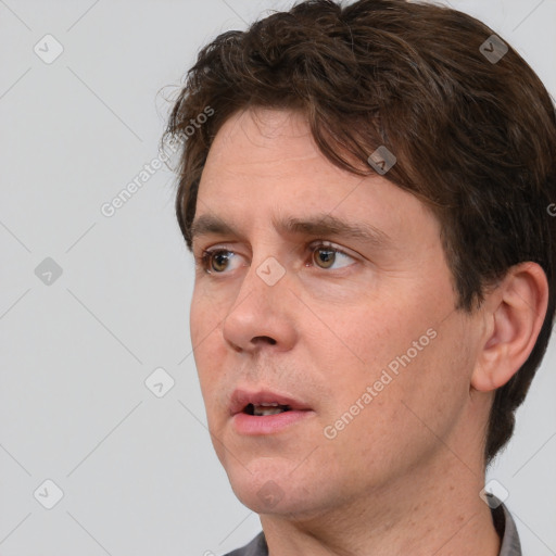 Neutral white adult male with short  brown hair and brown eyes