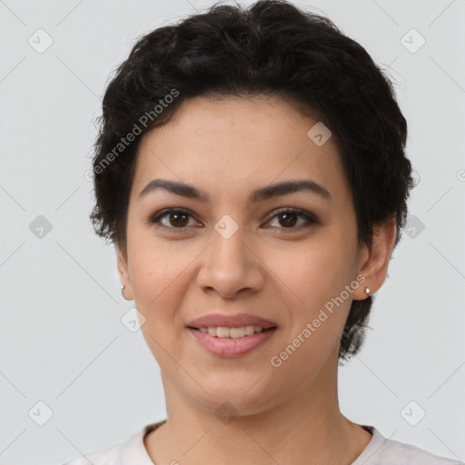 Joyful latino young-adult female with short  brown hair and brown eyes