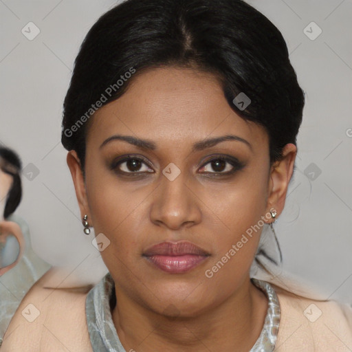 Joyful latino young-adult female with short  brown hair and brown eyes