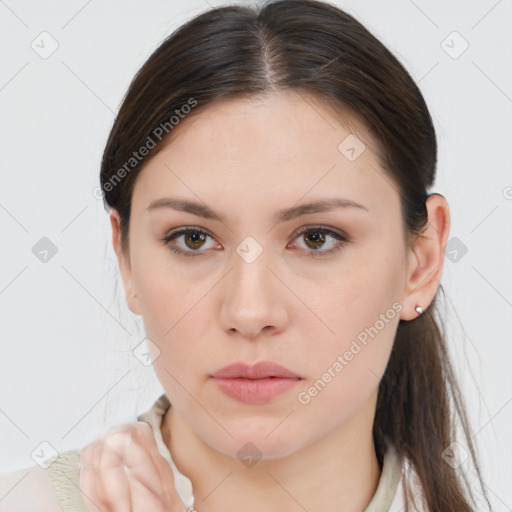 Neutral white young-adult female with medium  brown hair and brown eyes