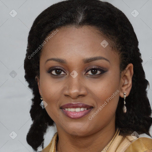 Joyful black young-adult female with long  brown hair and brown eyes