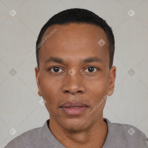 Neutral black young-adult male with short  black hair and brown eyes